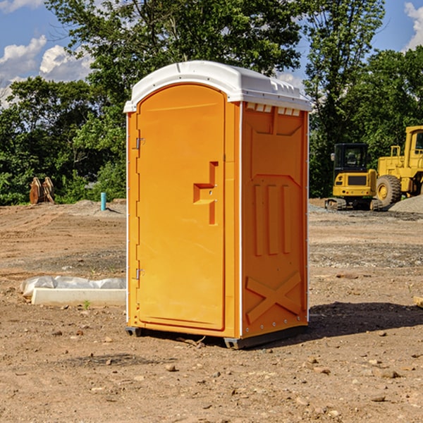 what is the cost difference between standard and deluxe portable restroom rentals in Sherando